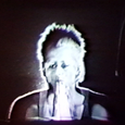Performers: K.J. Holmes, Houston-Jones - <a href="https://cathyweis.org/performance-histories/march-14-1994/" target="outside">DIA Center for the Arts 1994</a> <br/>Still from video by: Tal Yarden