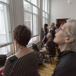 Audience members watching Douglas Dunn + Dancers across courtyard - <a href="https://cathyweis.org/calendar/time-travel-with-madame-xenogamy-2/" target="outside">April 10, 2016</a><br/>
Photo by Richard Termine